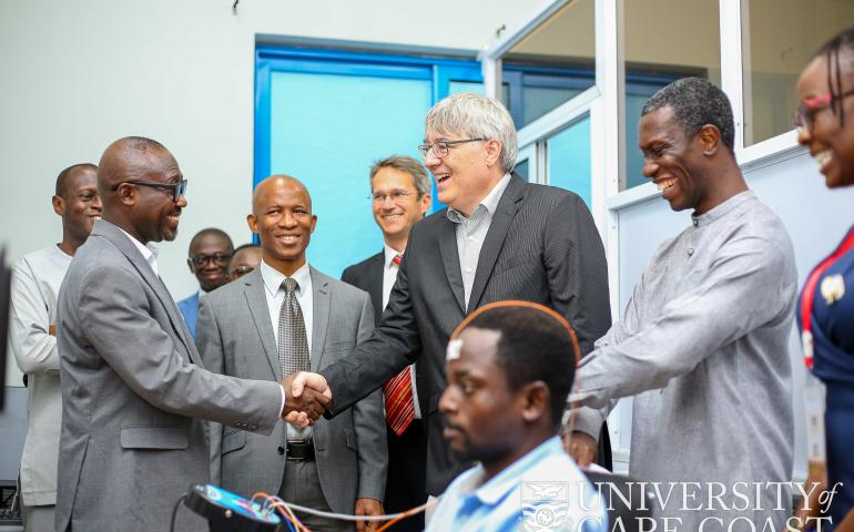 Prof. Sven Heinrich in an handshake with Prof. Denis Aheto